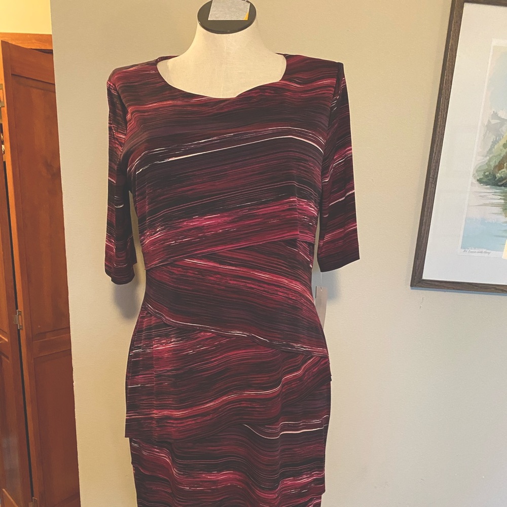 Really cute fitted flattering dress.